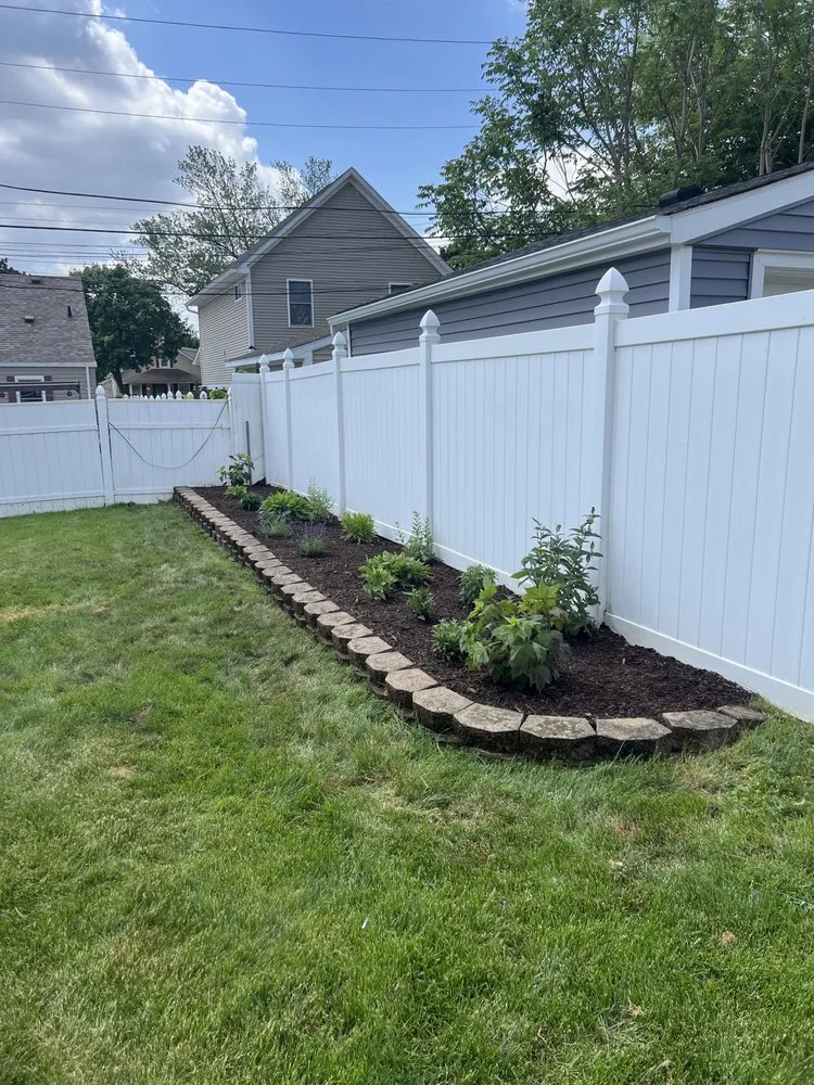 Affordable lawn mowing service with custom design in Walled Lake, MI by Green Thumb Garden Services