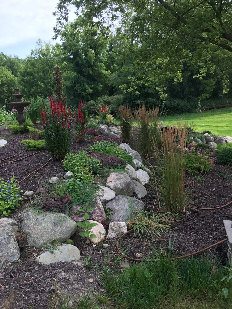 Trusted yard maintenance for homes across Walled Lake, MI - Green Thumb Garden Services