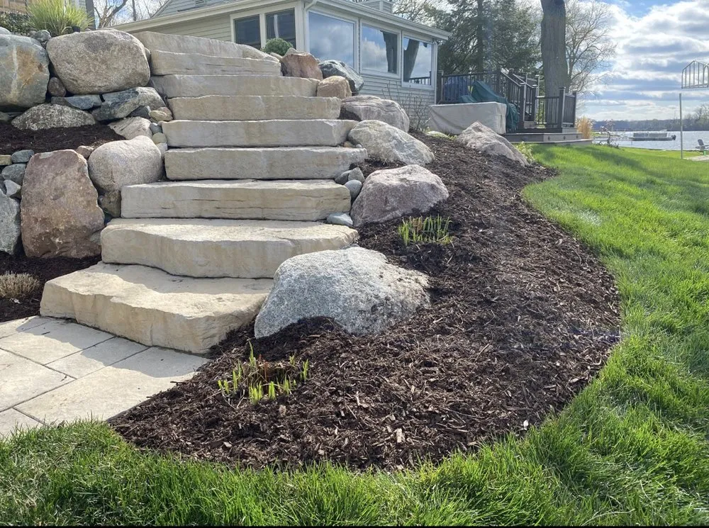 Professional yard maintenance for outdoor upgrades across Walled Lake, MI - Green Thumb Garden Services
