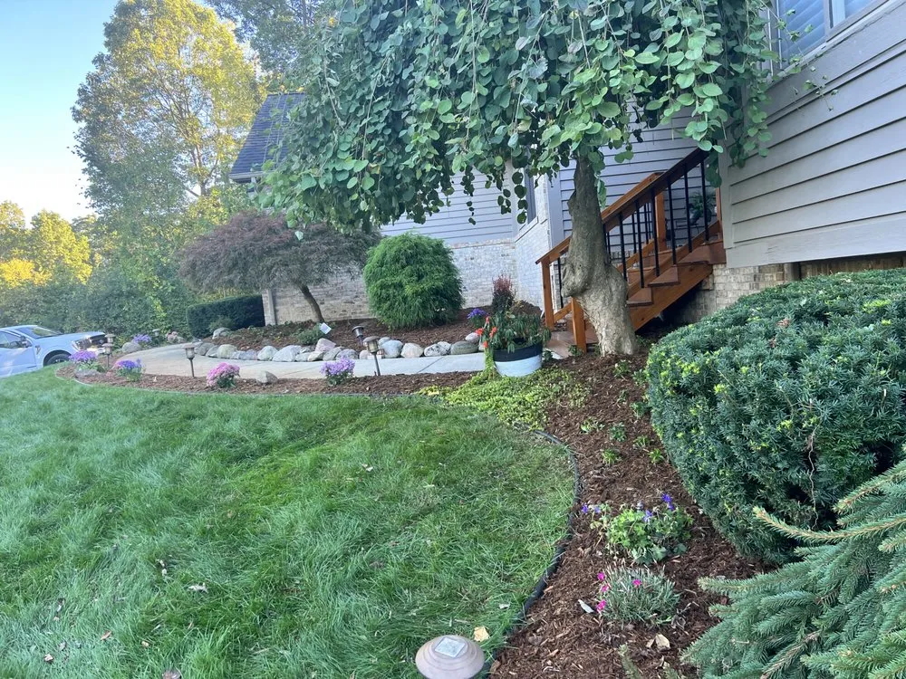 Custom yard maintenance with custom design across Walled Lake, MI - Green Thumb Garden Services