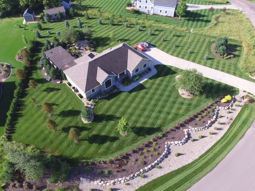 Reliable landscape design for year-round maintenance in Milford, NE by Green Thumb Lawn Service