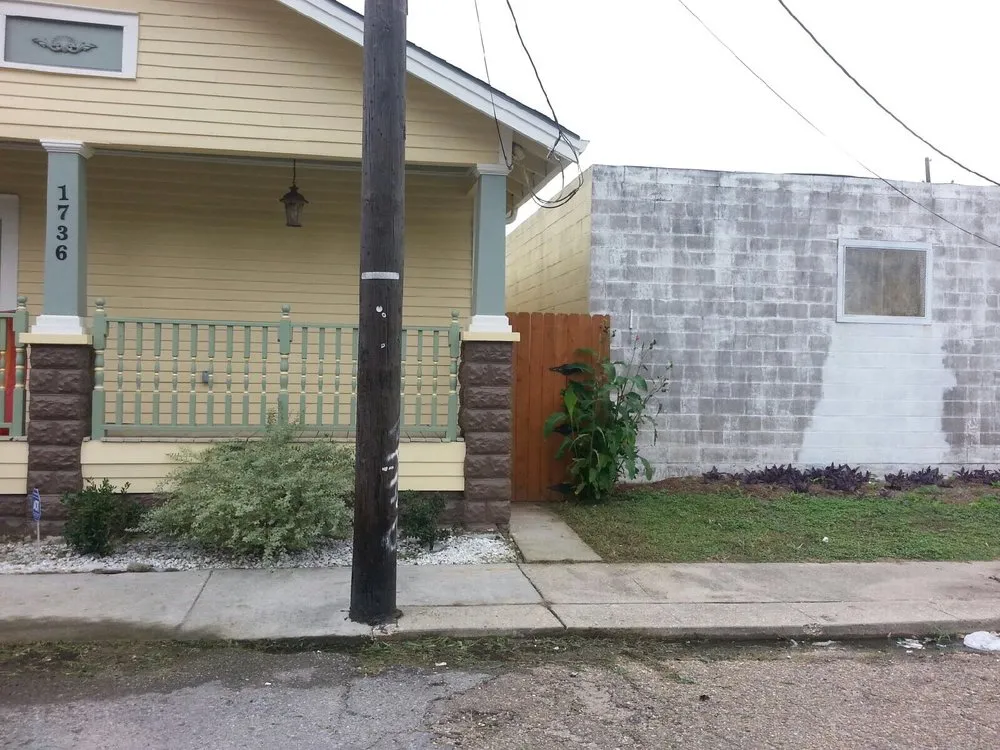 Local landscape installation for homes in New Orleans, LA by Green Thumb Lawn Service