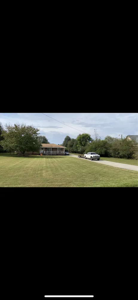 Top-rated landscape design for homes in Loganville, GA by Green Thumbs Up Lawn Maintenance