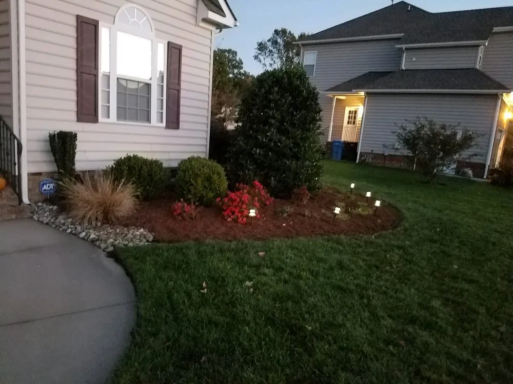 Custom lawn care service for residential properties in Norfolk, VA by Green Top Lawn