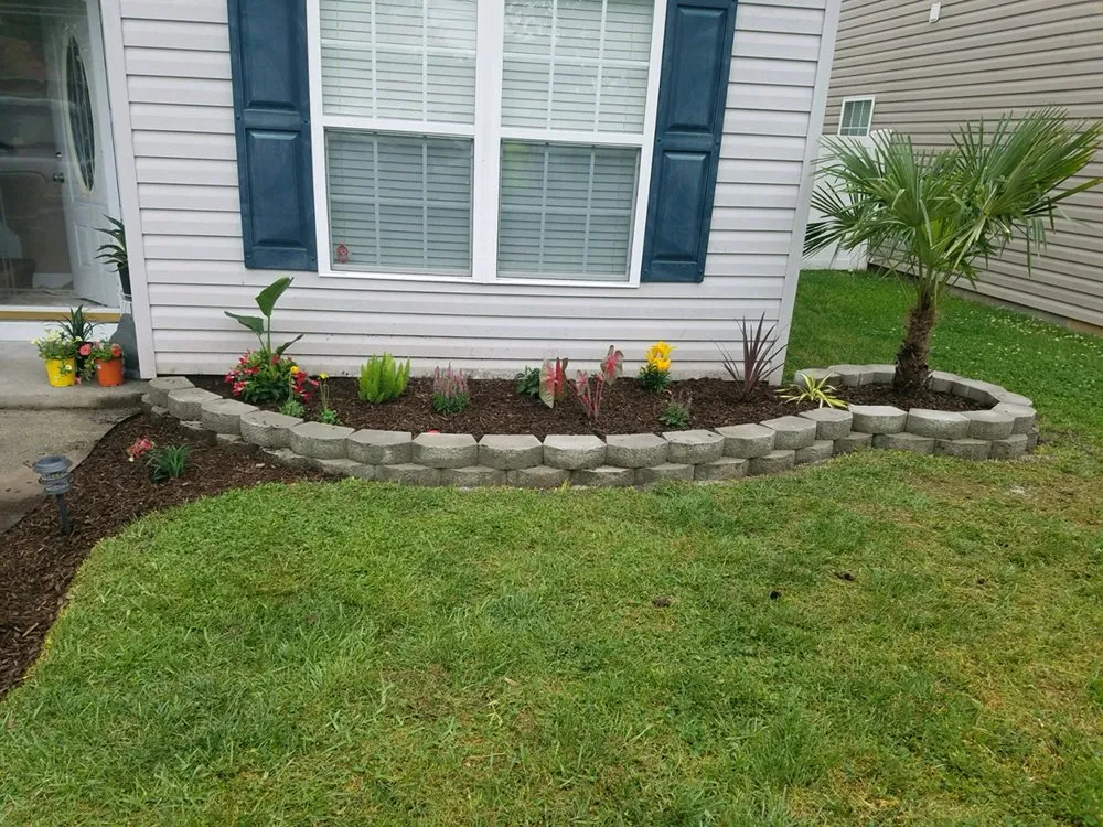 Custom outdoor landscaping for homes in Norfolk, VA by Green Top Lawn