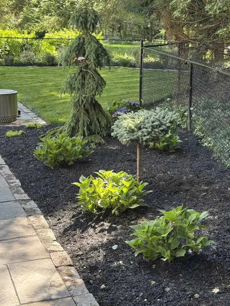 Custom landscape design for residential properties in Schenectady, NY by Green Wave Lawn And Landscape