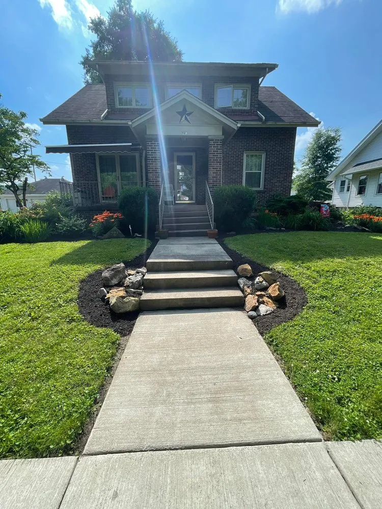 Custom yard cleanup service for homes in Lancaster, OH by Green World Lawn and Landscape