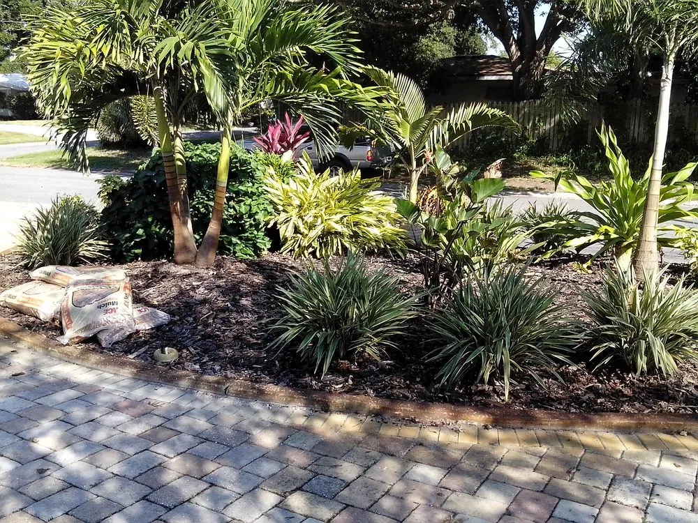 Trusted lawn mowing service in Saint Petersburg, FL by Green World Pavers Landscaping