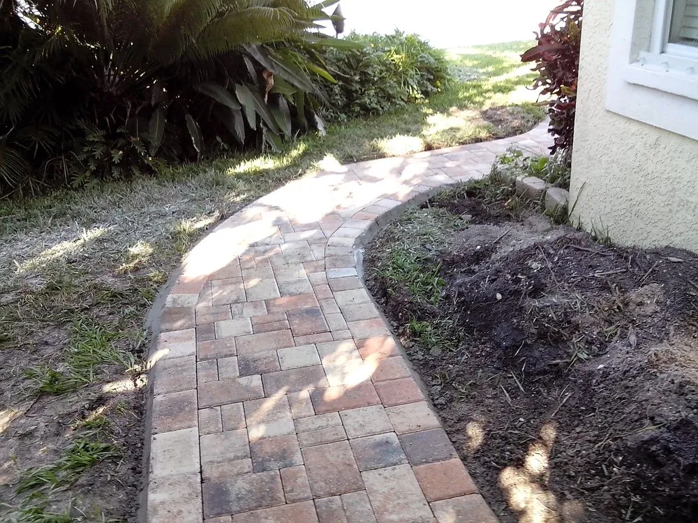 Expert yard maintenance for residential properties across Saint Petersburg, FL - Green World Pavers Landscaping