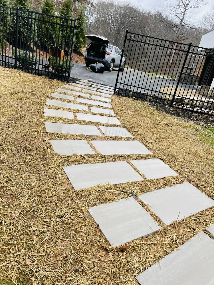 Expert landscaping services for year-round maintenance in Potomac, MD by Green Yard Keeper