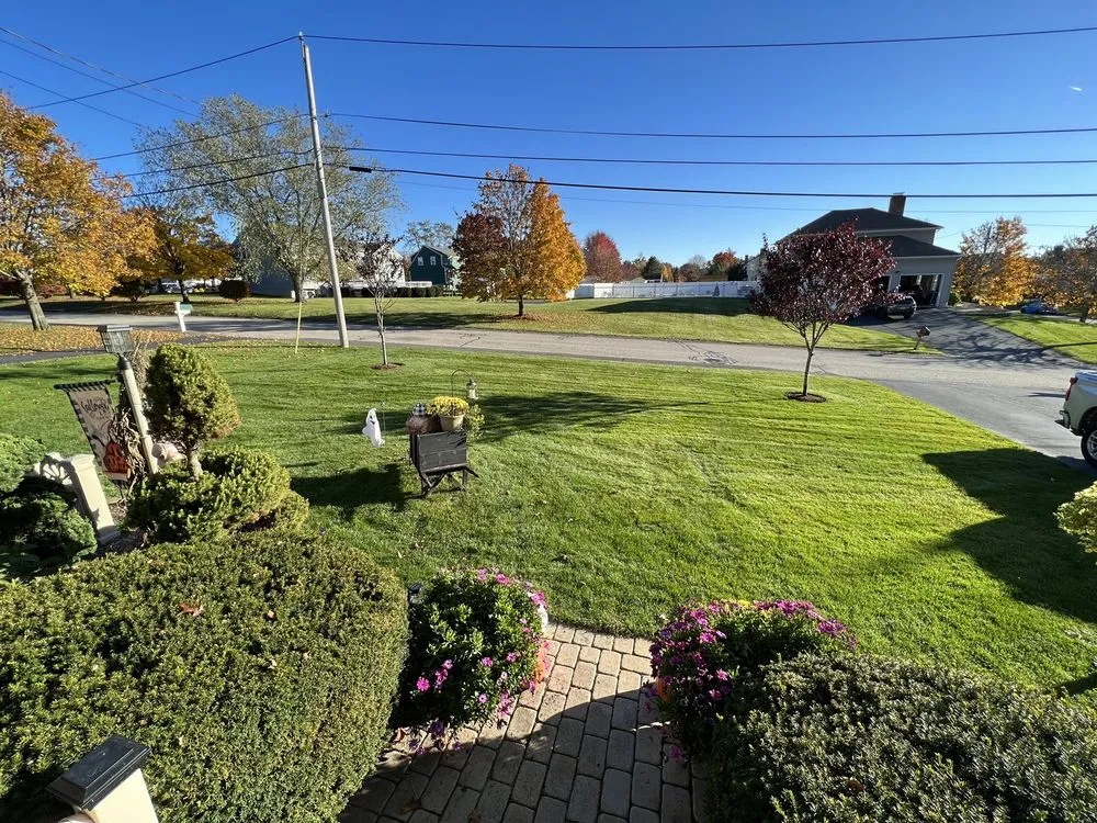 Custom landscape design for homes in Foxborough, MA by GreenAce Lawn Care