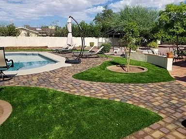 Custom landscape installation in Central Islip, NY by Greenapple Landscapes