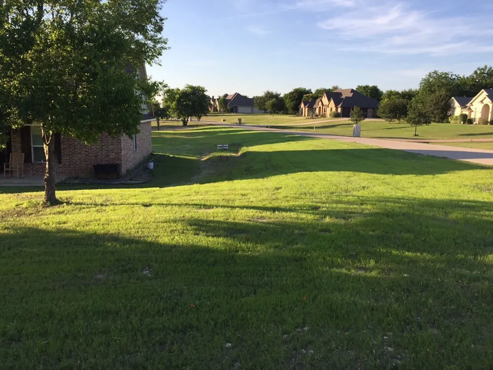 Expert landscape installation for beautiful yards in Crowley, TX by GreenCare Lawn and Landscape