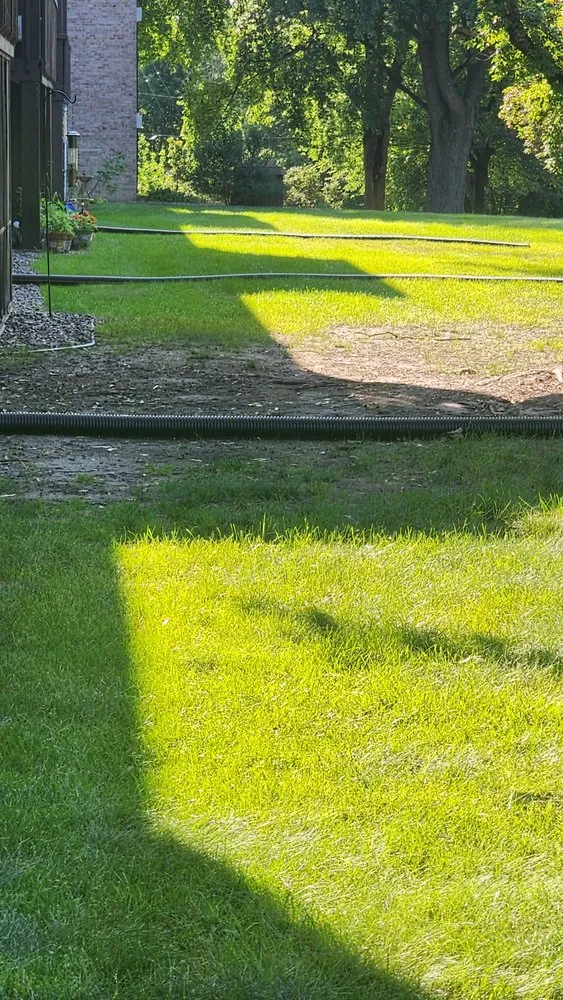 Professional landscape installation with custom design across Mounds View, MN - Greendonkey Lawncare