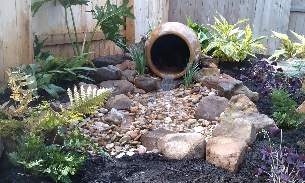 Custom garden landscaping for residential properties in Austin, TX by Greener Austin