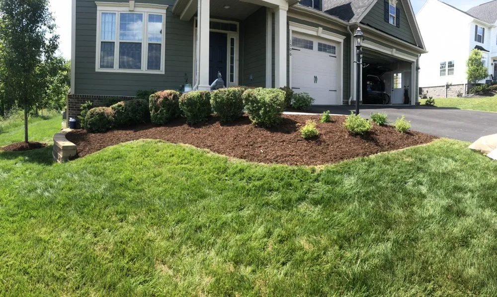 Professional landscaping services for homes in Ellwood City, PA by Greener Concepts Lawn Care Solutions