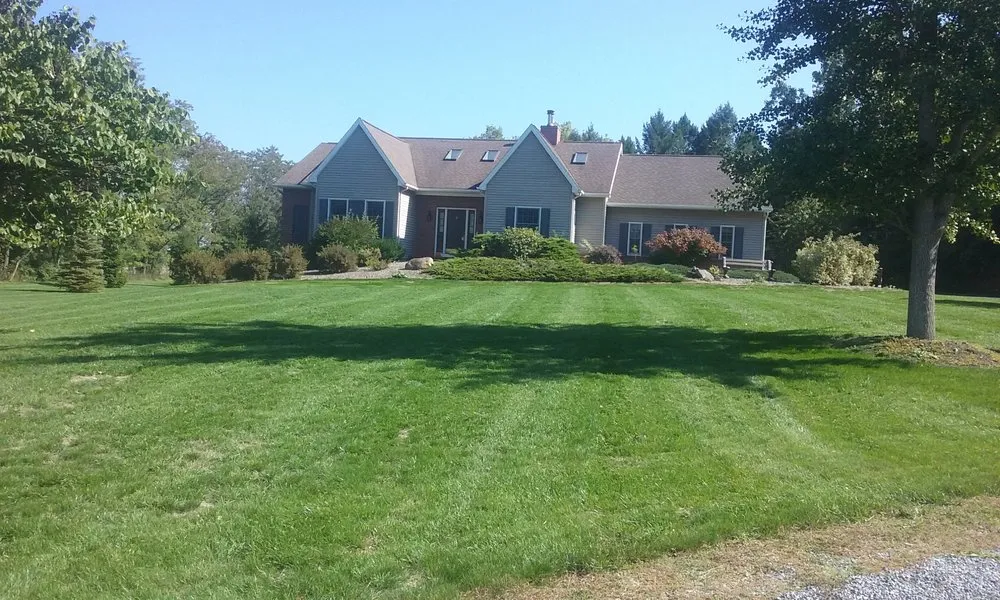 Local landscaping services for residential properties in Canandaigua, NY by Greener Earth LawnCare