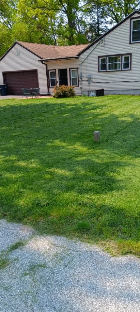 Affordable outdoor landscaping for homes in Michigan City, IN by Greener Grass & Landscapes