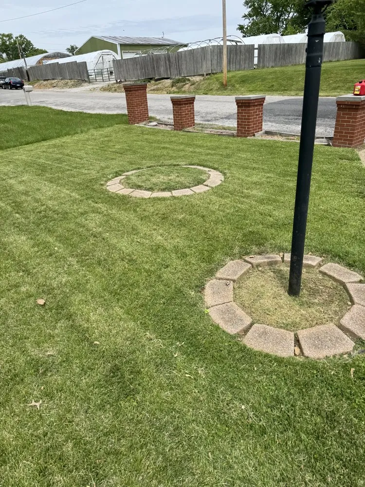 Custom yard cleanup service with custom design in Mascoutah, IL by Greener Grass Lawn Service