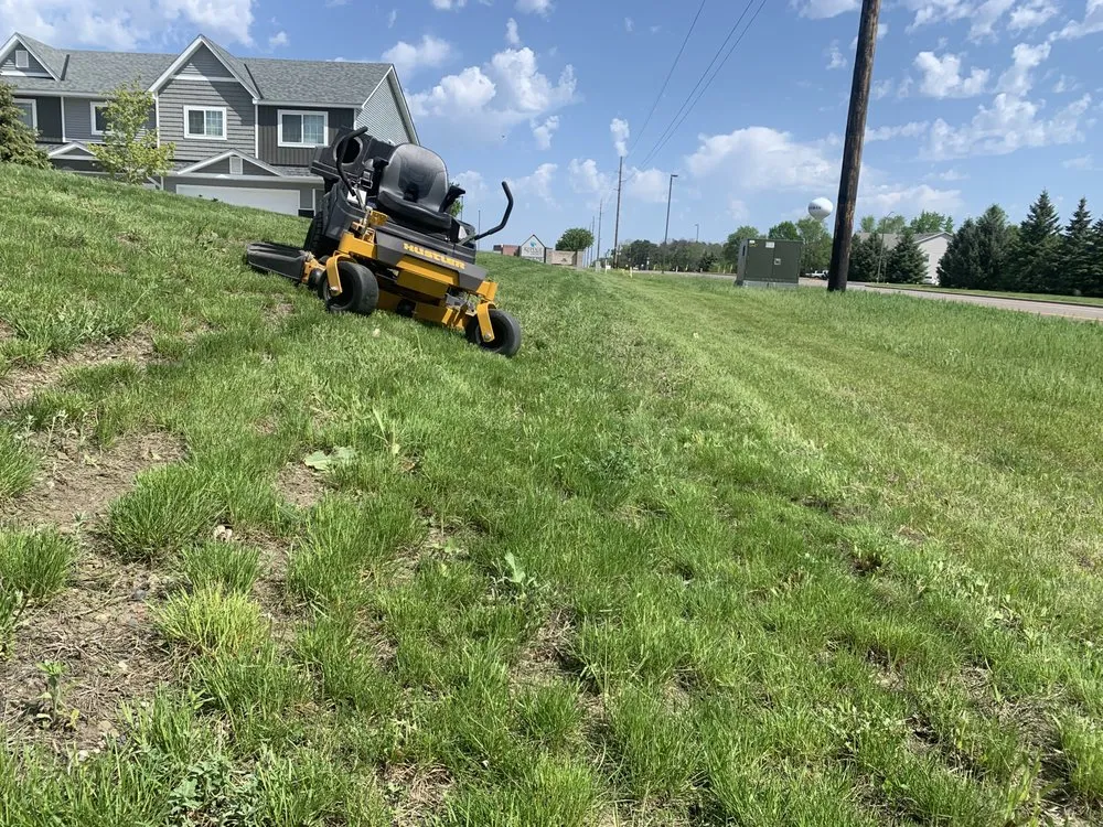 Custom outdoor landscaping for residential properties in Zimmerman, MN by Greener Grass Lawn Services