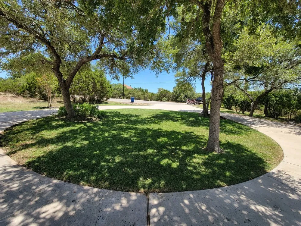 Professional outdoor landscaping with custom design in San Antonio, TX by Greener Grasses