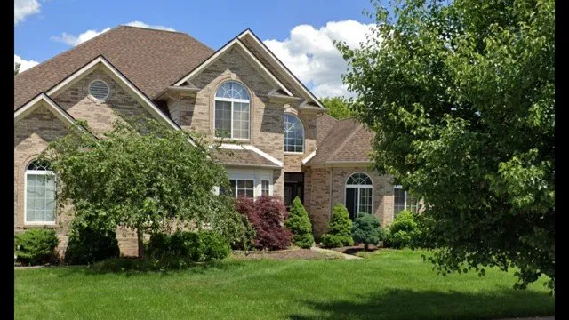 Expert yard cleanup service for year-round maintenance in Flat Rock, MI by Greener Lawns