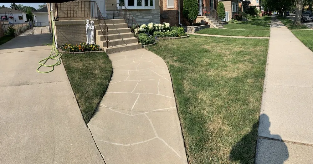 Expert lawn mowing service for homes in Chicago, IL by Greener Living