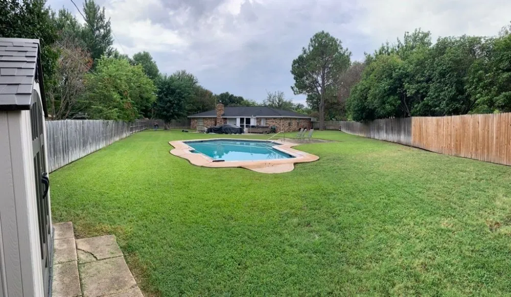 Affordable landscape installation for year-round maintenance in Arlington, TX by GreenHound Landscaping