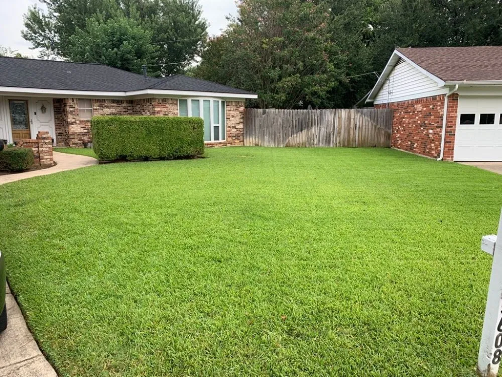 Local lawn mowing service for year-round maintenance in Arlington, TX by GreenHound Landscaping