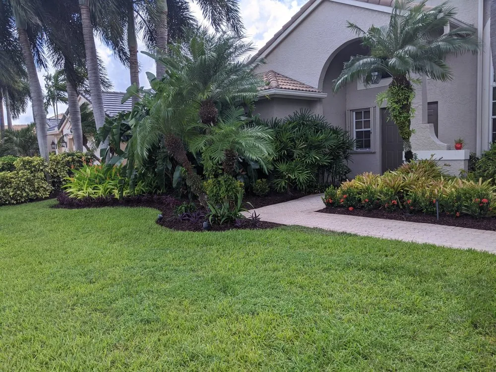 Custom outdoor landscaping for homes in Davie, FL by Greenier Lawn Care