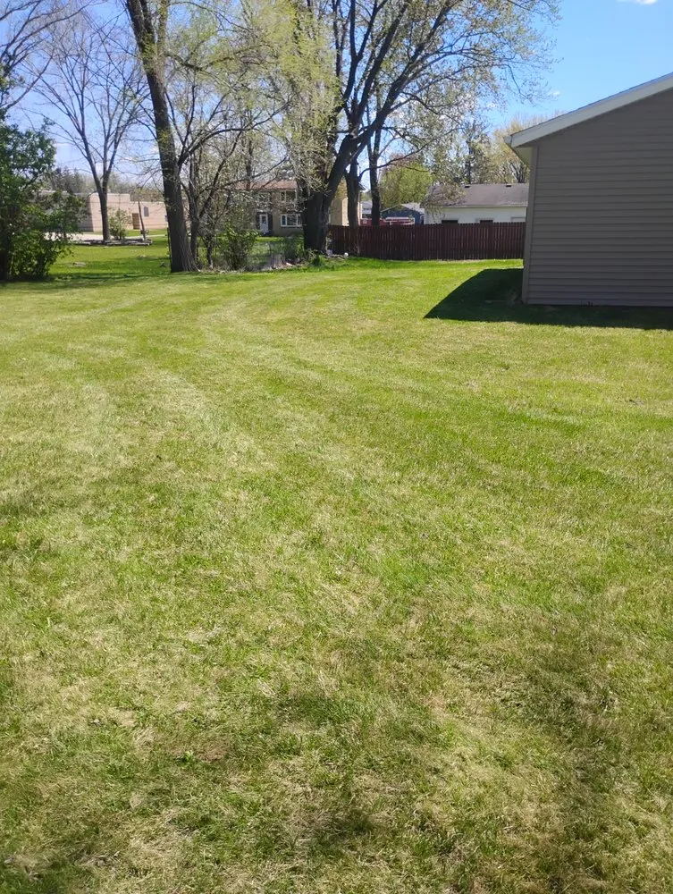 Custom outdoor landscaping for residential properties across Mauston, WI - Greenify Lawn Care