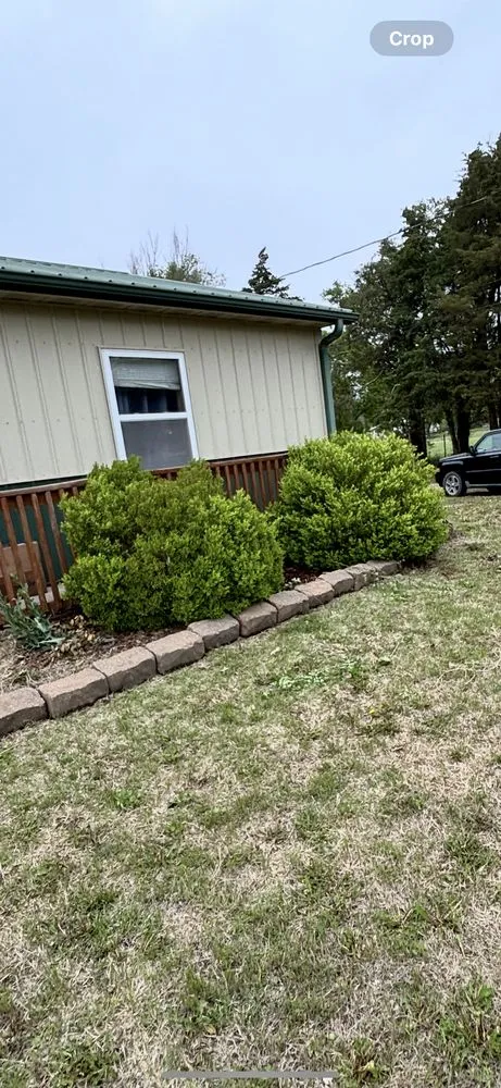 Professional lawn mowing service in Sterling, KS by GreenLine Landscaping