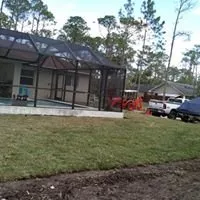 Custom landscape installation for residential properties in Clewiston, FL by Greenline Sod
