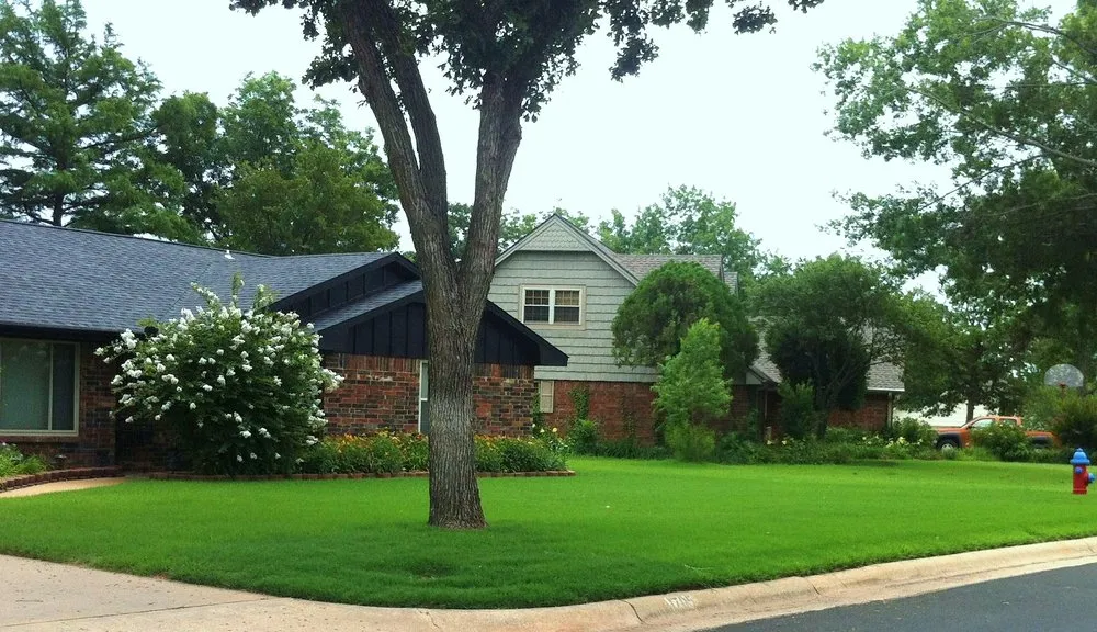 Custom lawn care service with custom design in Stillwater, OK by GreenMaster