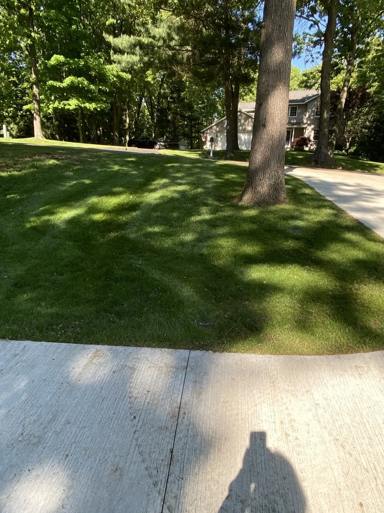 Professional outdoor landscaping for residential properties in Rockford, MI by Greenop's Lawn & Landscapes