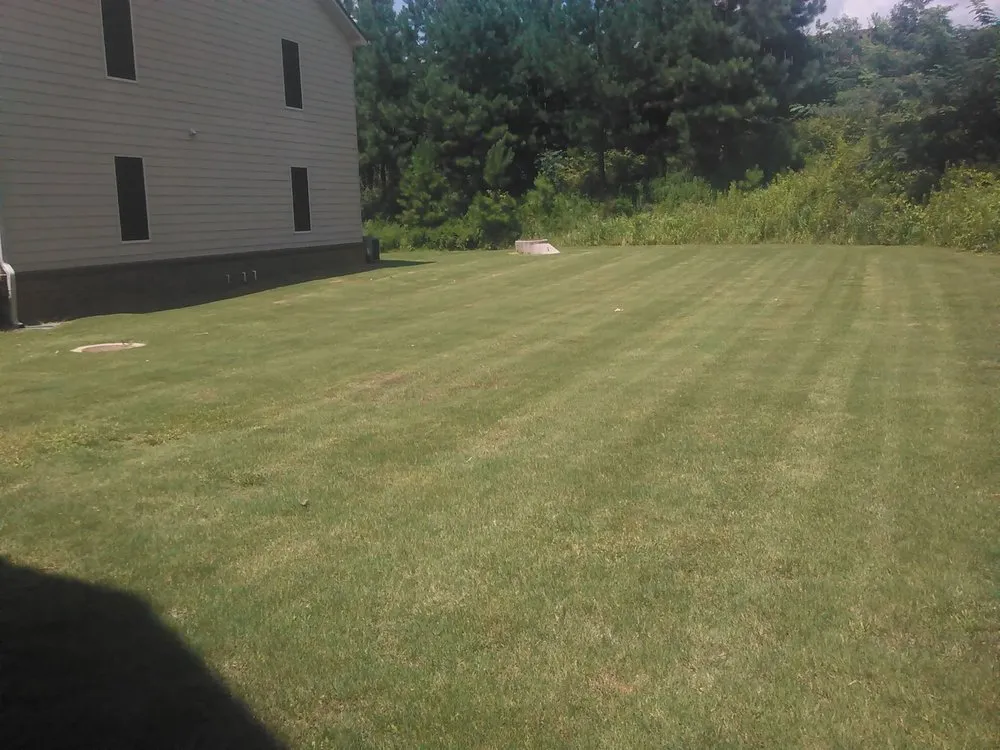 Trusted lawn mowing service in Monroe, GA by Greens Lawn Care