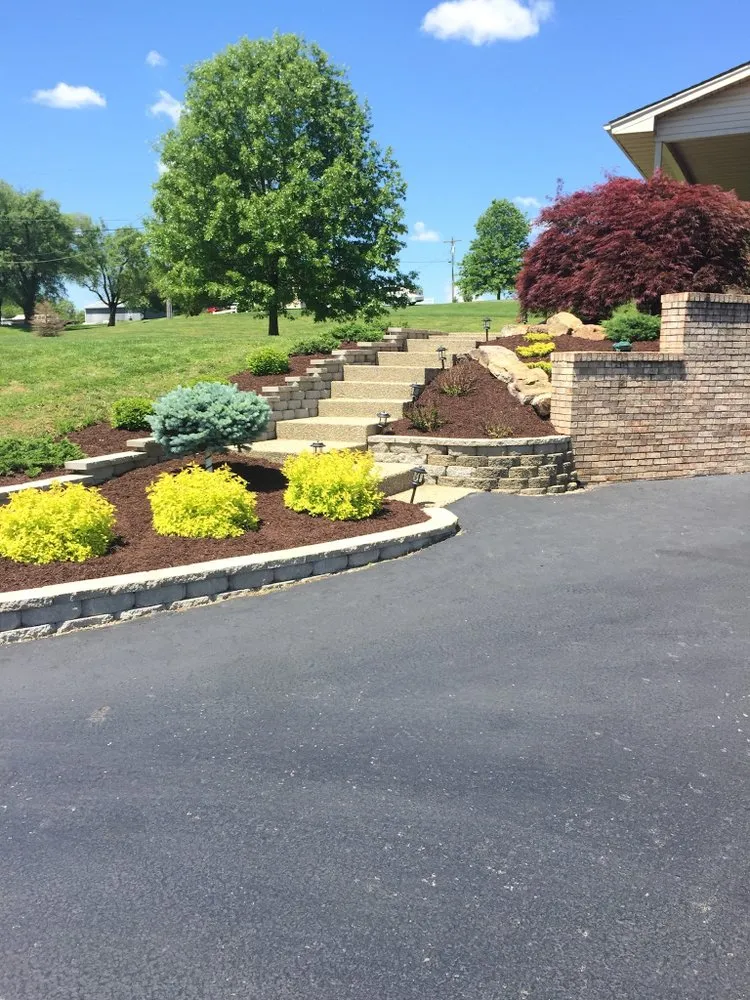 Affordable lawn mowing service for year-round maintenance in Salem, IN by Green’s Lawn Service