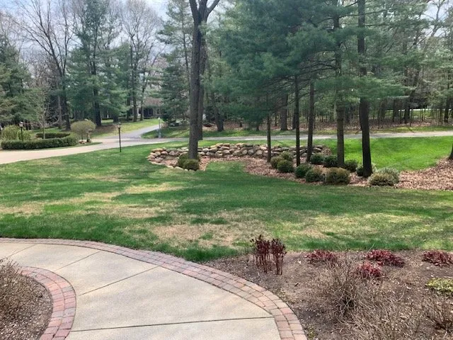 Affordable landscaping services for year-round maintenance in Dryden, MI by Greens Master Lawn and Pest Control