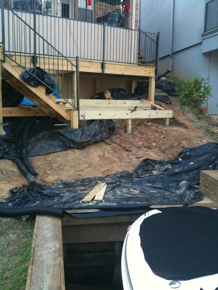 Professional yard cleanup service with custom design in Conroe, TX by Greenscape Innovations