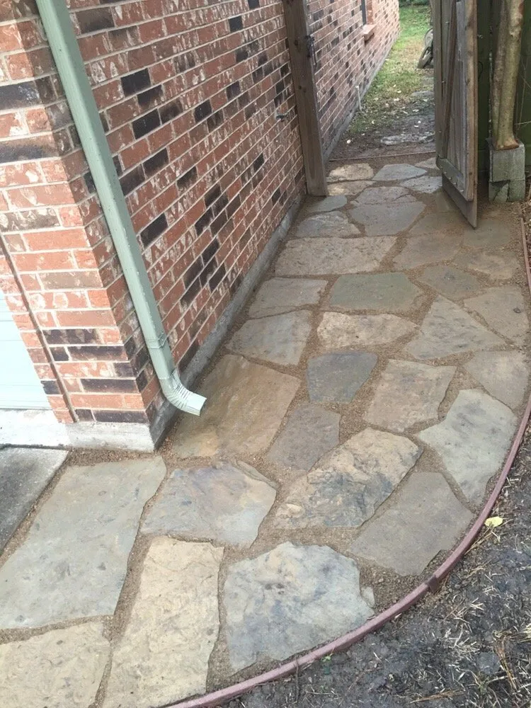 Custom landscape installation for year-round maintenance in Houston, TX by Greenscapes Landscape & Irrigation