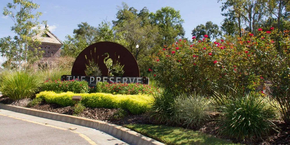 Custom garden landscaping with custom design in Greenwell Springs, LA by GreenSeasons