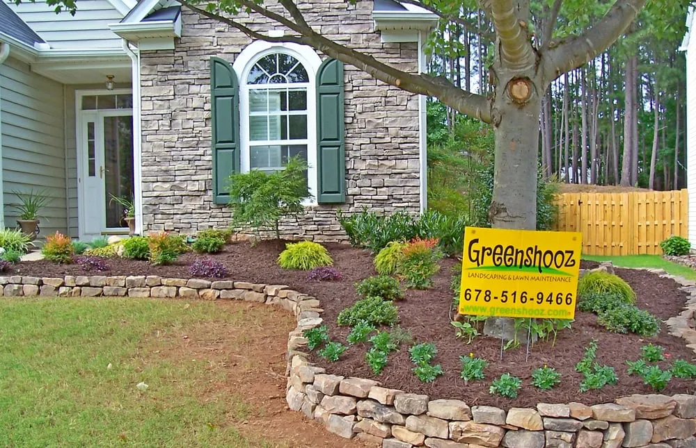 Custom landscape installation in Cumming, GA by Greenshooz Landscaping and Lawn Maintenance