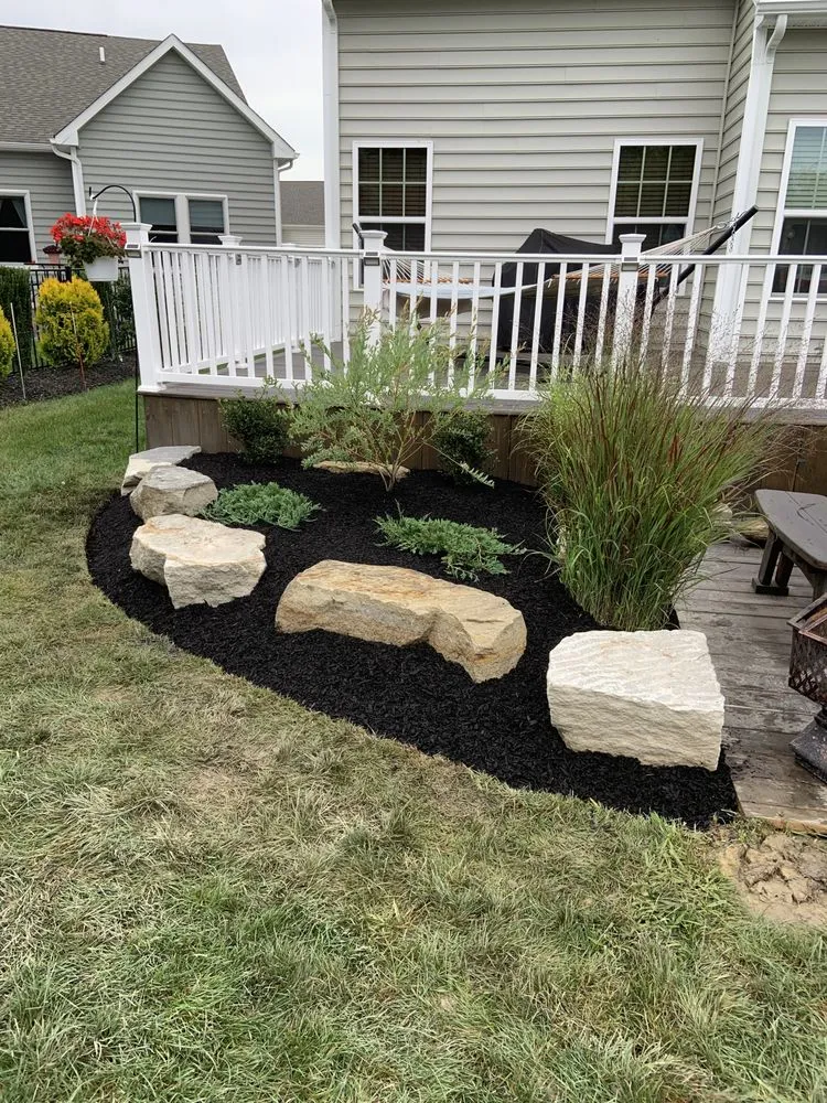Custom garden landscaping for residential properties in Painesville, OH by Greenside Landscapes