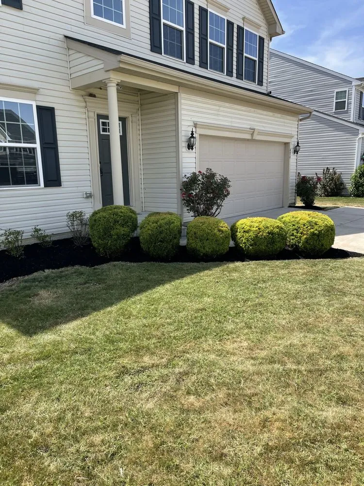Trusted lawn mowing service with custom design in Painesville, OH by Greenside Landscapes