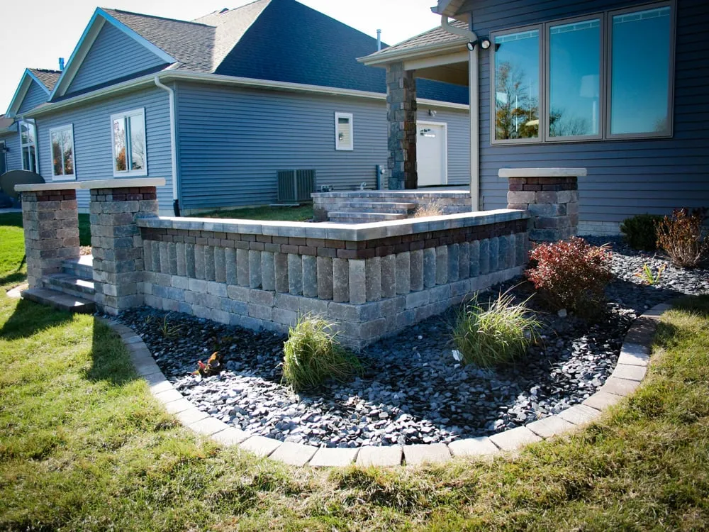 Affordable yard cleanup service with custom design in Bettendorf, IA by Greenspace Associates