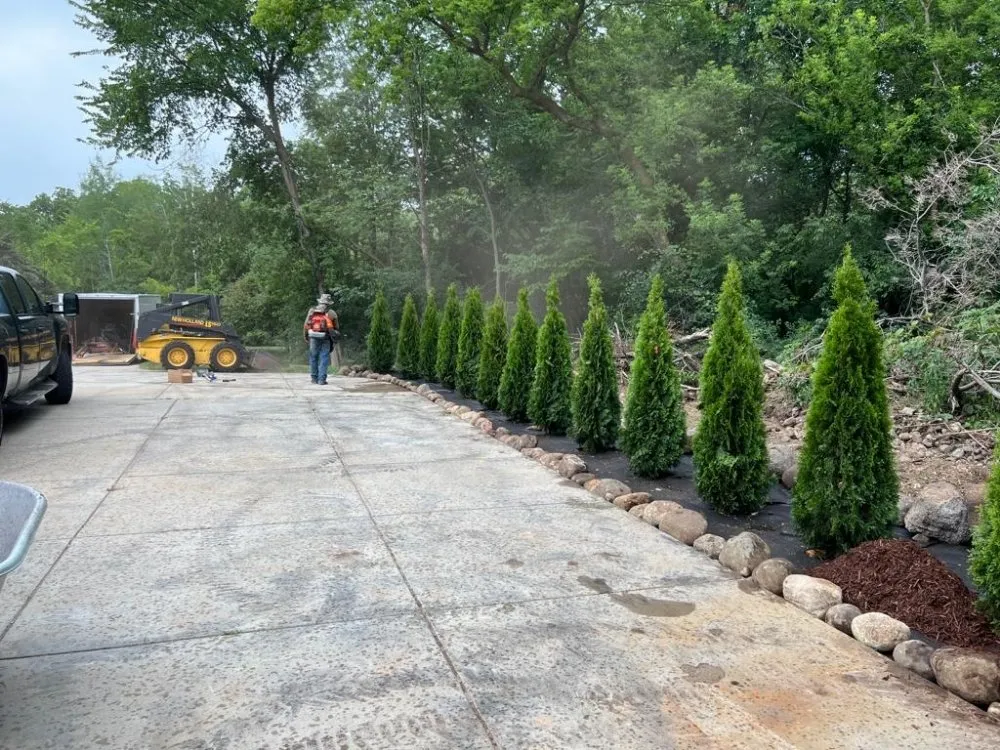 Local lawn mowing service with custom design in Waukesha, WI by Greenspace landscaping