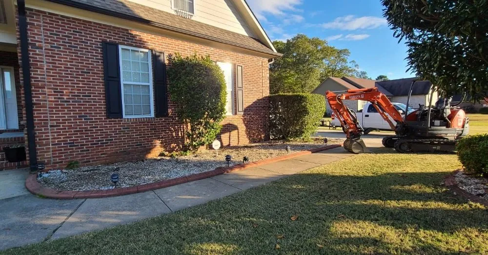 Local lawn mowing service for homes in Clinton, NC by GreenTouch landscapes