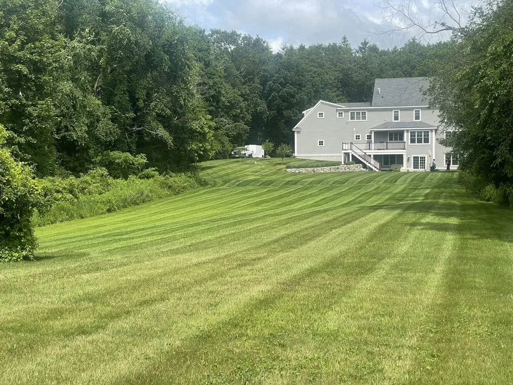 Expert lawn mowing service in Waltham, MA by Greenview Services