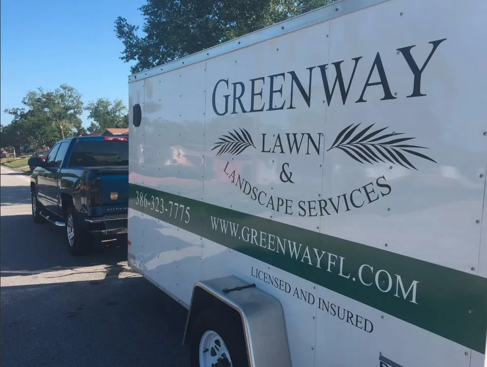 Professional yard cleanup service for outdoor upgrades in Daytona Beach, FL by Greenway Lawn and Landscape Design