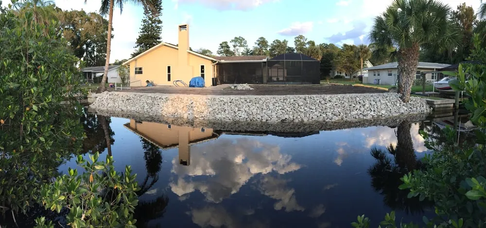Professional landscape installation for residential properties in Naples, FL by Greg Orick Marine Construction